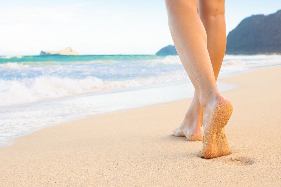 foot-on-the-beach-sand-sea.jpg